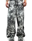 BLACK RUBBER FLOWERS PANTS