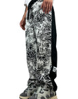 BLACK RUBBER FLOWERS PANTS