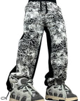 BLACK RUBBER FLOWERS PANTS