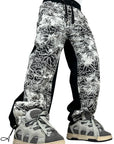 BLACK RUBBER FLOWERS PANTS