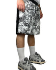 BLACK RUBBER FLOWERS SHORTS