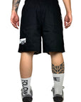 BLACK RUBBER FLOWERS SHORTS