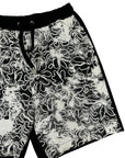 BLACK RUBBER FLOWERS SHORTS