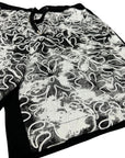 BLACK RUBBER FLOWERS SHORTS