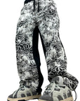 BLACK RUBBER FLOWERS PANTS
