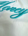 CREAM SCRIPT SHORTS